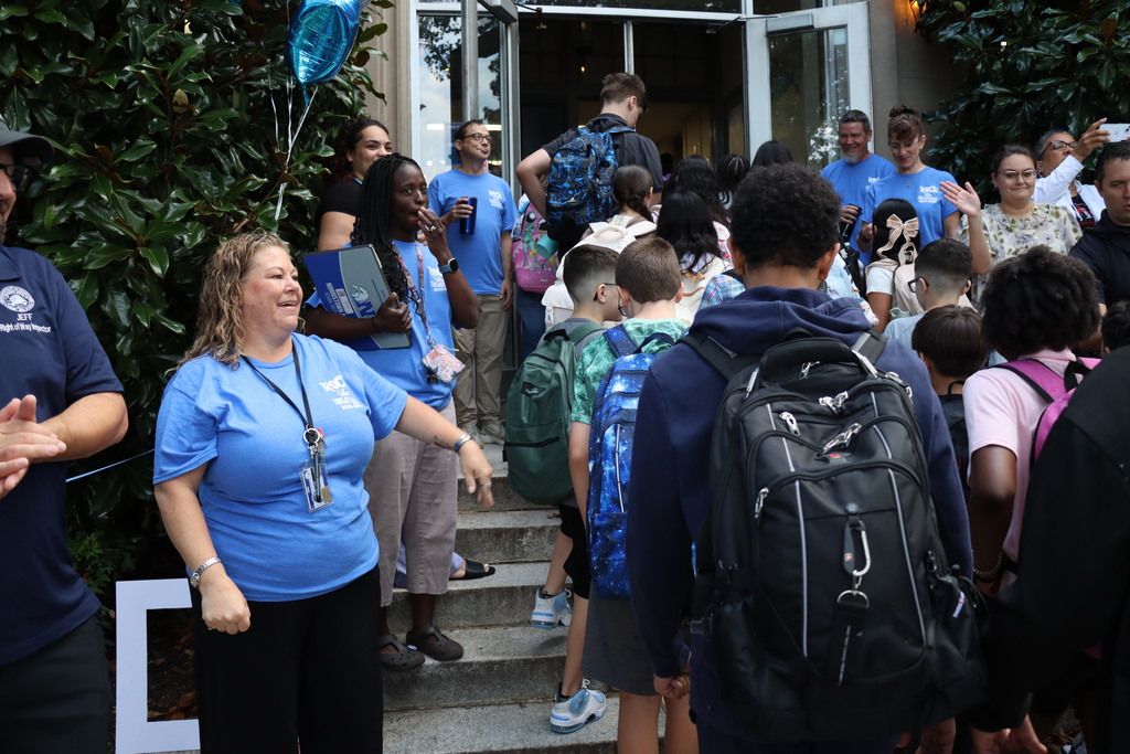Crowds of students entering Blockson Middle School.  More information in caption