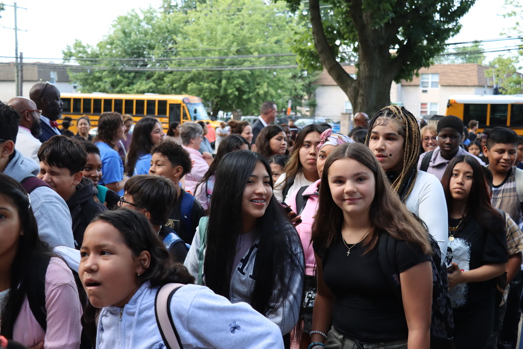 Crowds of students entering Blockson Middle School.  More information in caption