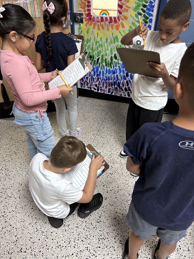 Students doing a school scavenger hunt