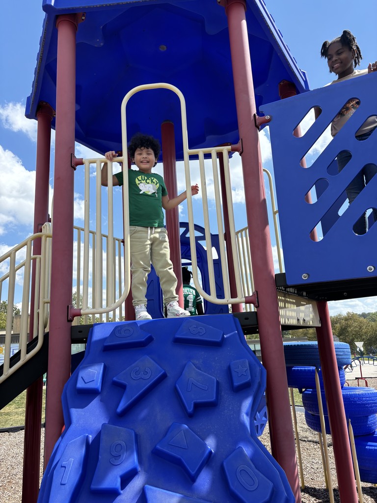 A student at recess ready to cheer on the Eagles!