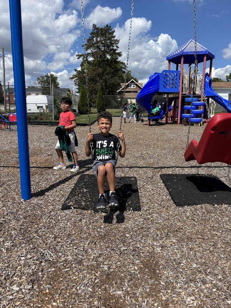 A student at recess ready to cheer on the Eagles!