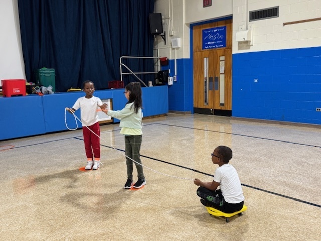A group of students working together in physical education class. 