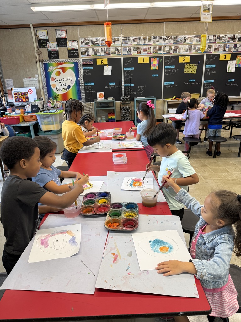 Kindergartners painting for Dot Day.