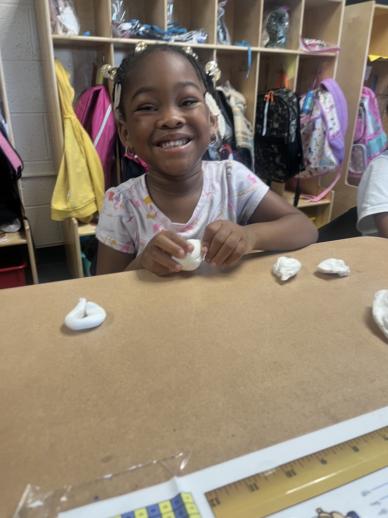Students making clay pumpkins