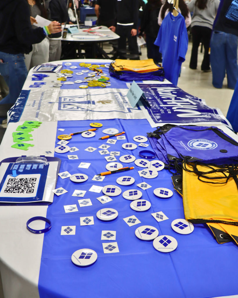 NAHS Honor Society table with items displayed for students to take.