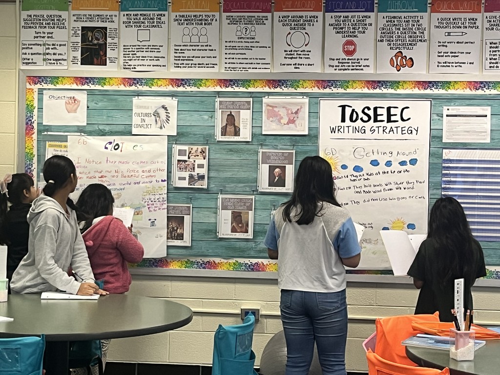 Students working on an ELA project. More information in caption.