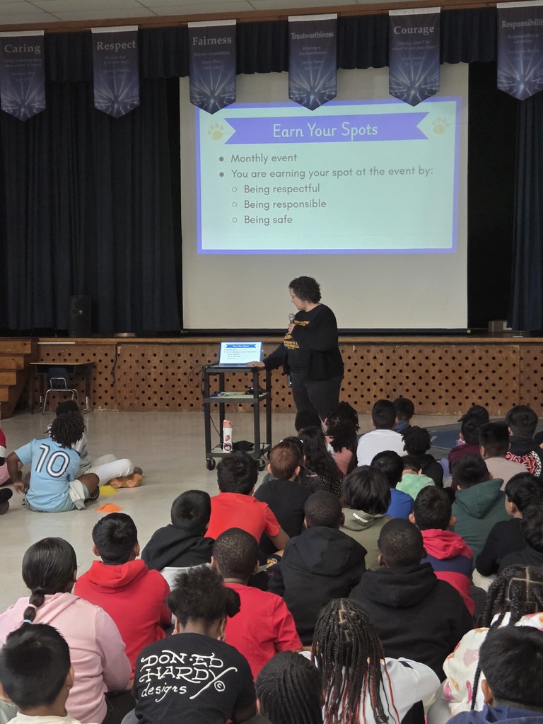 Students listen at the Jaguar Assembly.