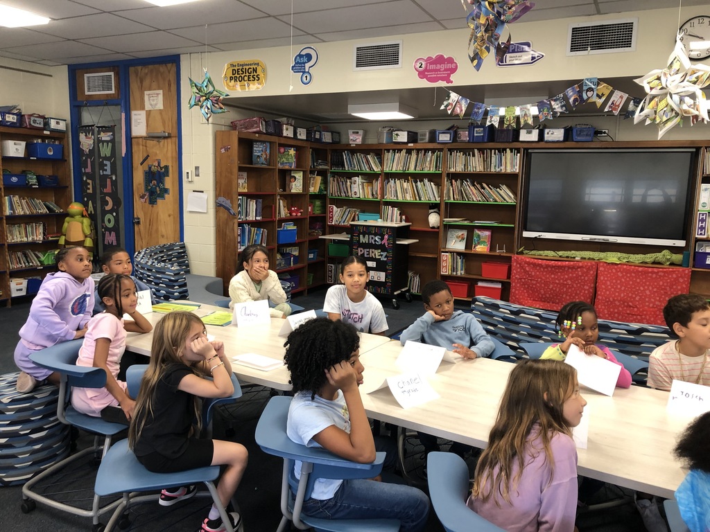 Students having a conversation with Mr. Dormer