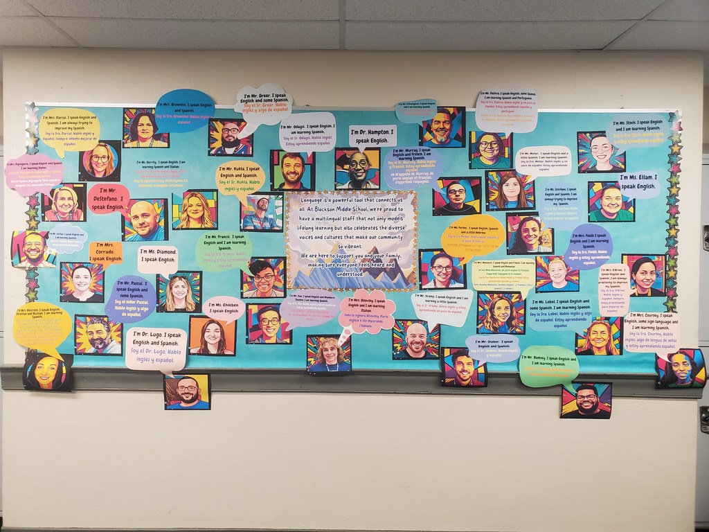 Bulletin board with multi-lingual staff members at Blockson Middle School