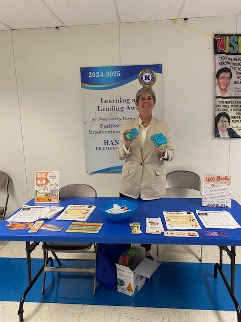 A representative from the Library sharing information with families