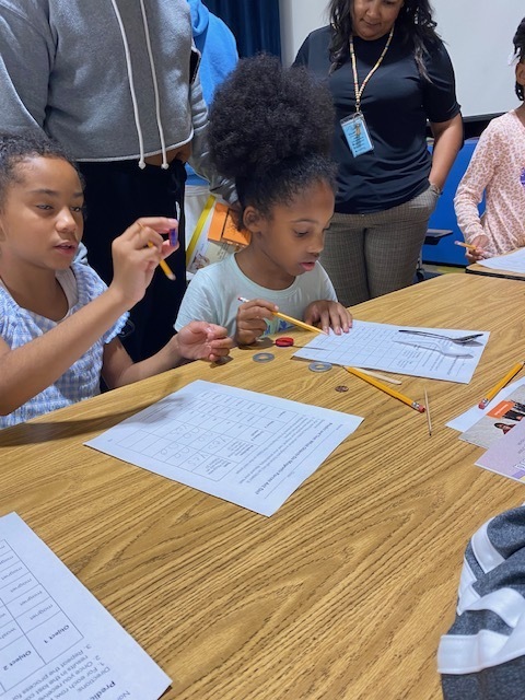 Students working at an event