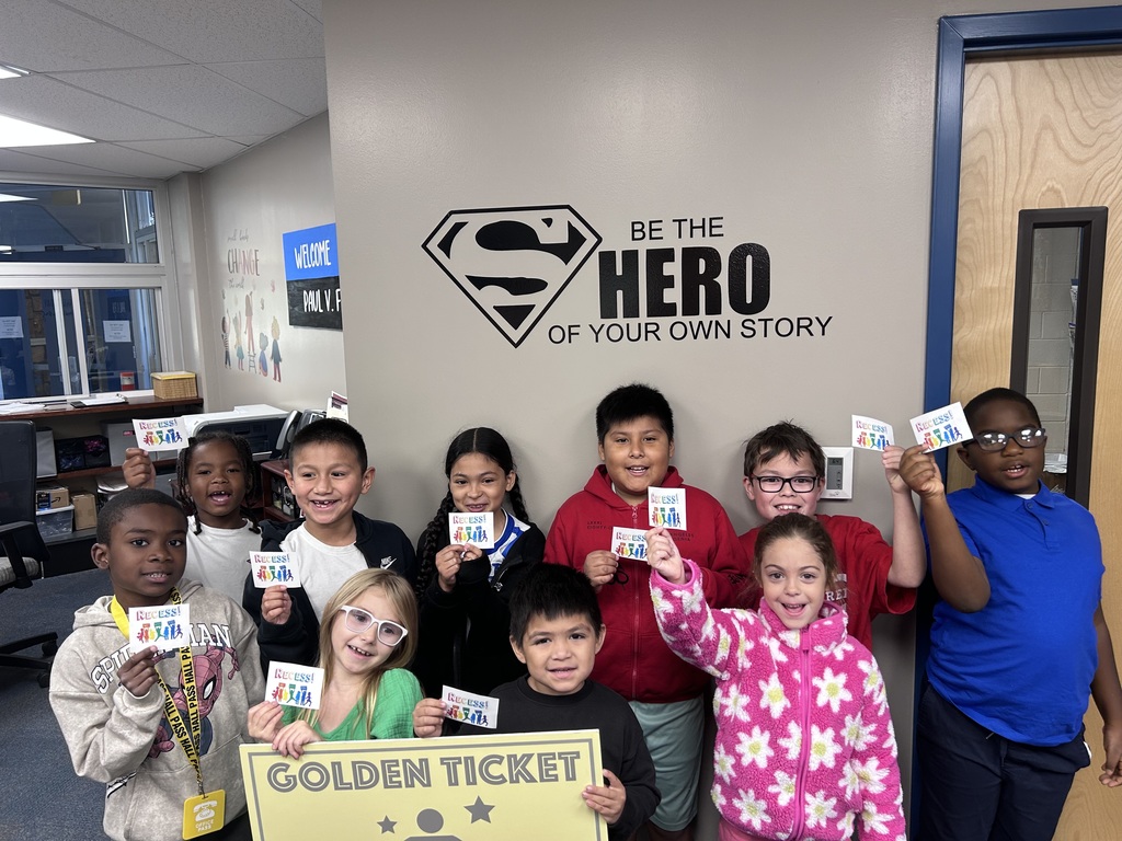 Weekly Golden Ticket winners holding up their extra recess tickets.