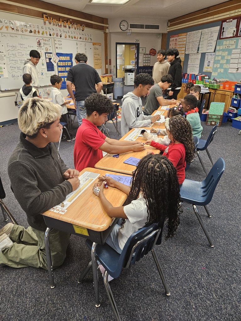 High School Raices students celebrated Hispanic Heritage Month with our First Grade students
