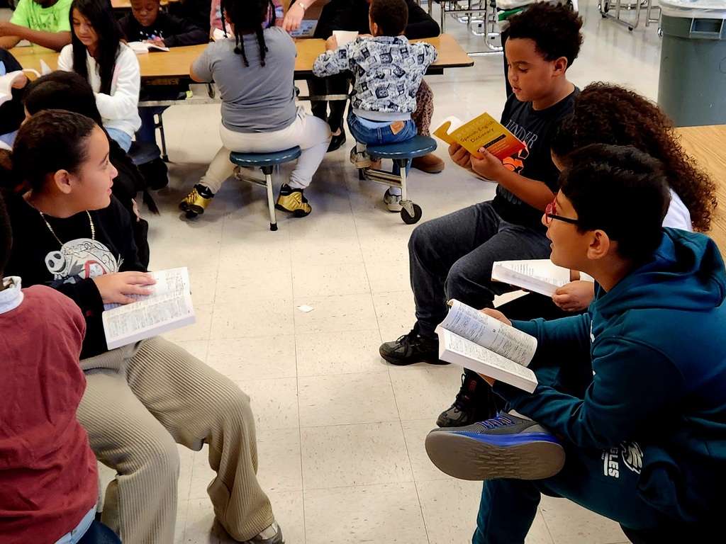 Third graders receive Spanish/English dictionaries from the Norristown Rotary Club.