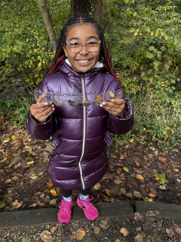 A fourth grader shares her discoveries at Riverbend while learning about ecosystems.