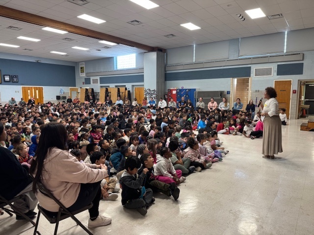 Mrs. Falco speaks to the students about Mexican traditions.
