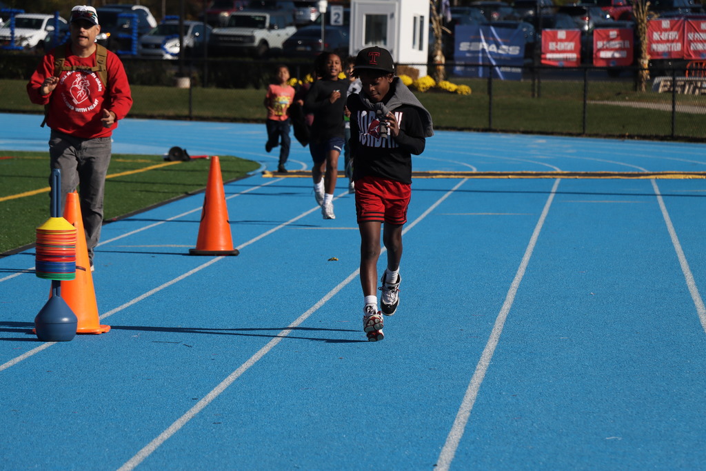4th Grade Student walking at the Walk - A - Thon.