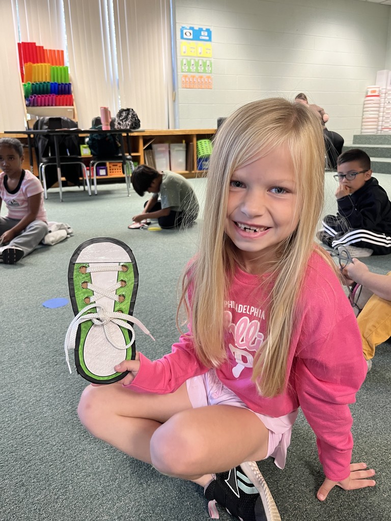 A 1st Grader with their practice shoe.