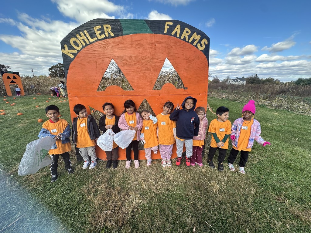Kindergarteners pose for a photo at Kohler Farms.