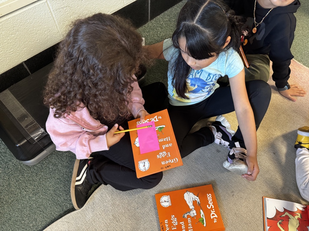 1st Grade Students reading Green Eggs and Ham.