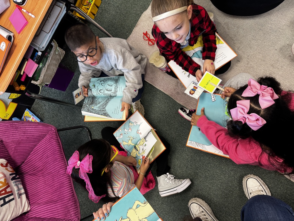 1st Grade Students reading Green Eggs and Ham.