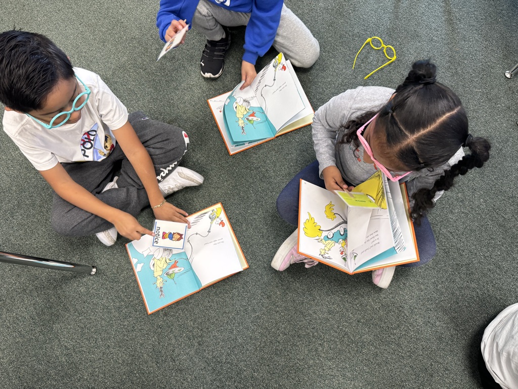 1st Grade Students reading Green Eggs and Ham.