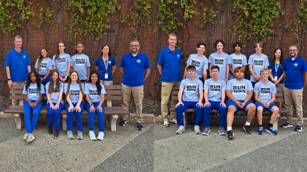 Cross Country Girls and Boys teams pose for photo with coaches.