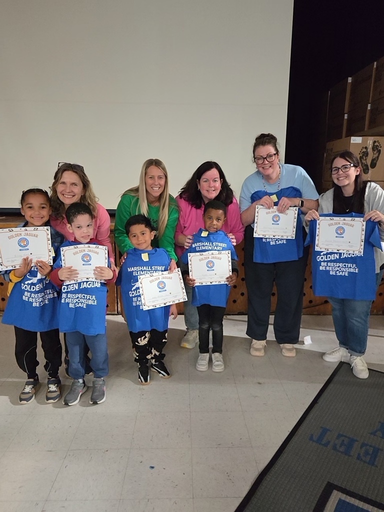 Kindergarten's Golden Jaguars with their teachers.