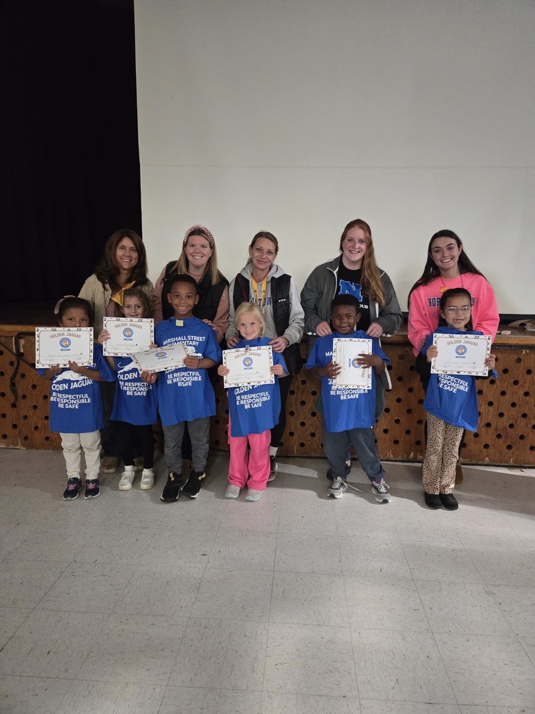 First grade's Golden Jaguars with their teachers.