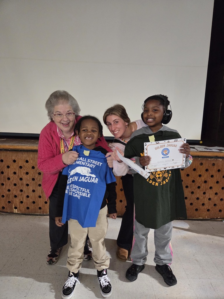 A-Team's Golden Jaguars with their teachers.