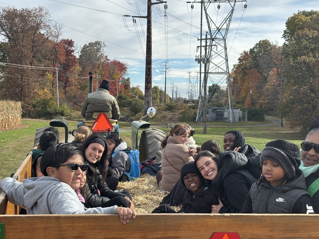 Students and teachers on the hayride