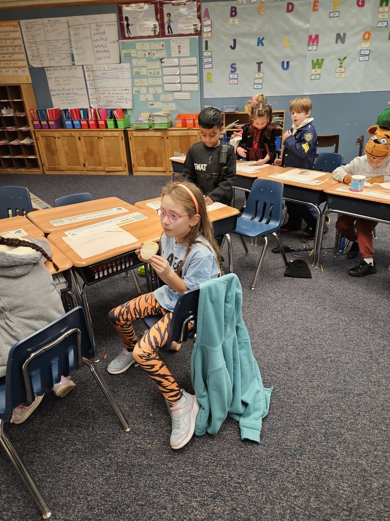 First Grade cookie decorating for PBIS reward. 