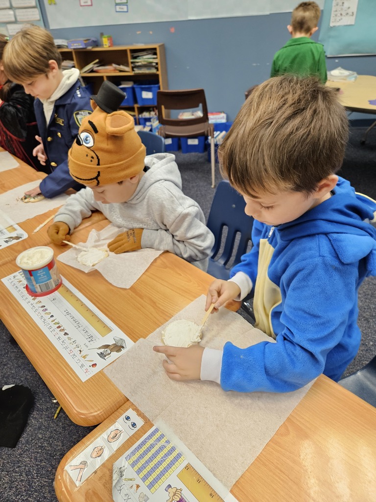 First Grade cookie decorating for PBIS reward. 