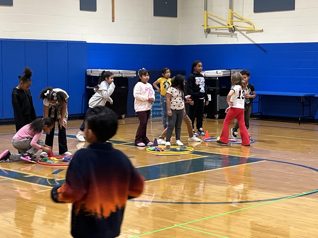 Third graders play the game "Steal a Jewel."