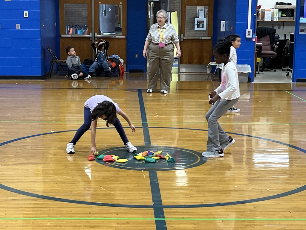 Third graders play the game "Steal a Jewel."