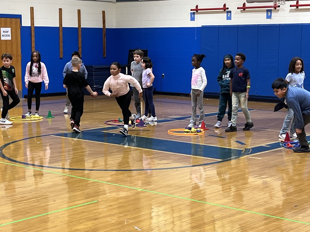 Third graders play the game "Steal a Jewel."