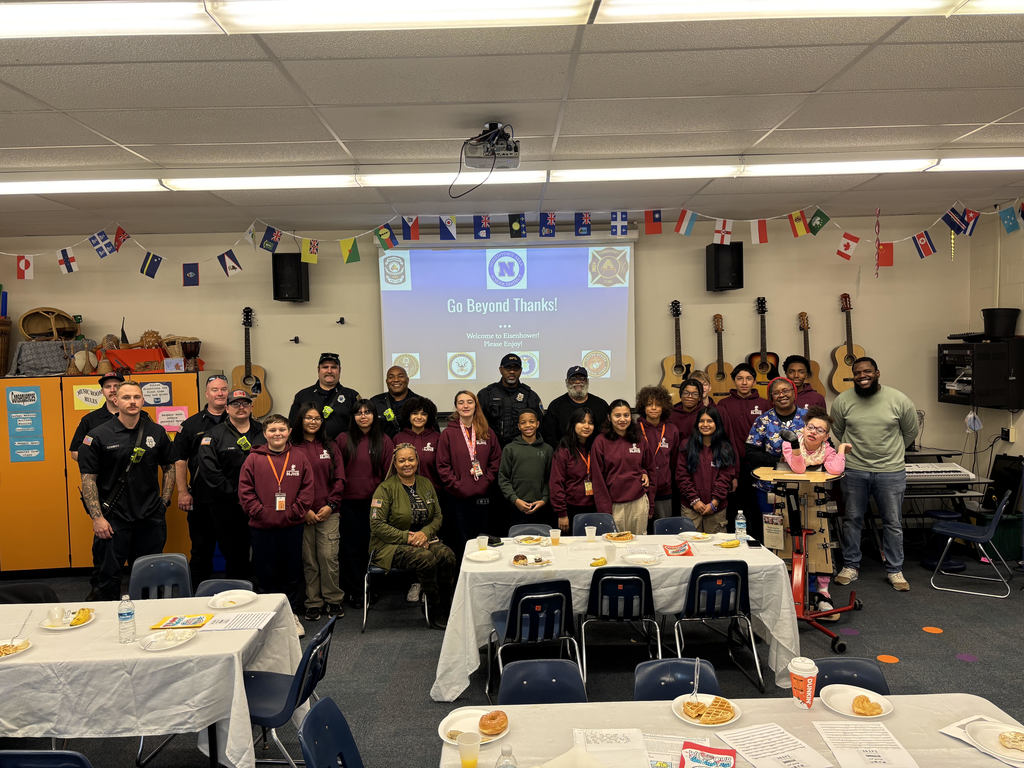 ESTLA NJHS pose for photo with their first responder and veteran guests during their annual breakfast.