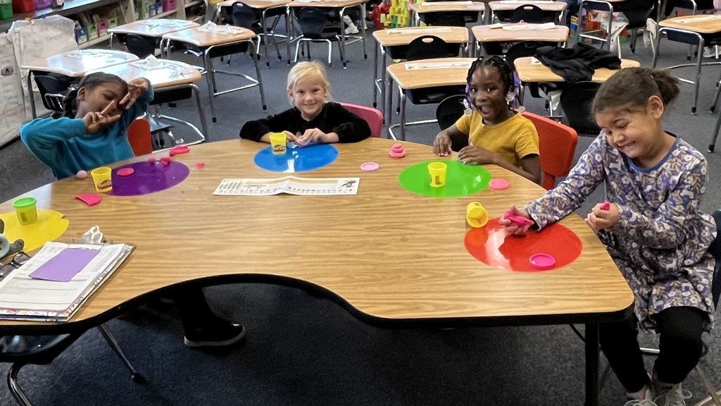 First grade working on cooperation, social skills and STEM projects.