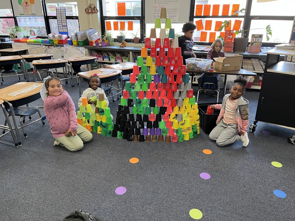 First grade working on cooperation, social skills and STEM projects.