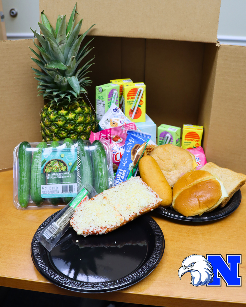 Meal box contents displayed on table.