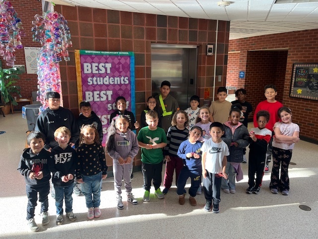 The students that earned 5 PAWS.