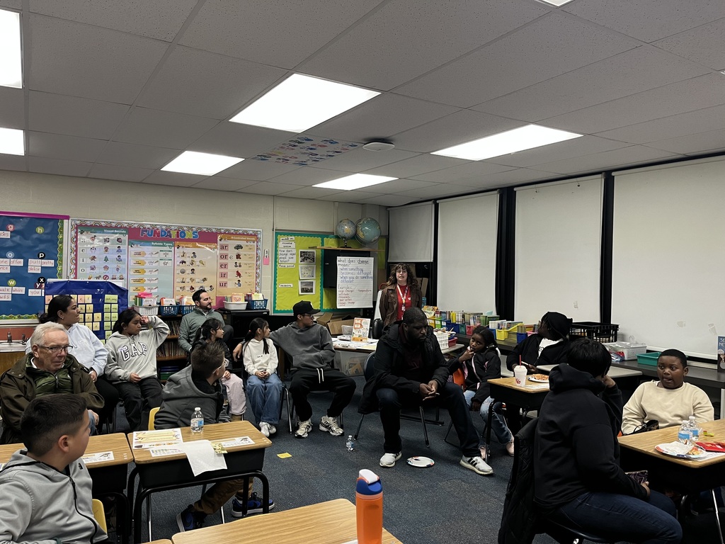 Public Library speaker and families at the Science Workshop