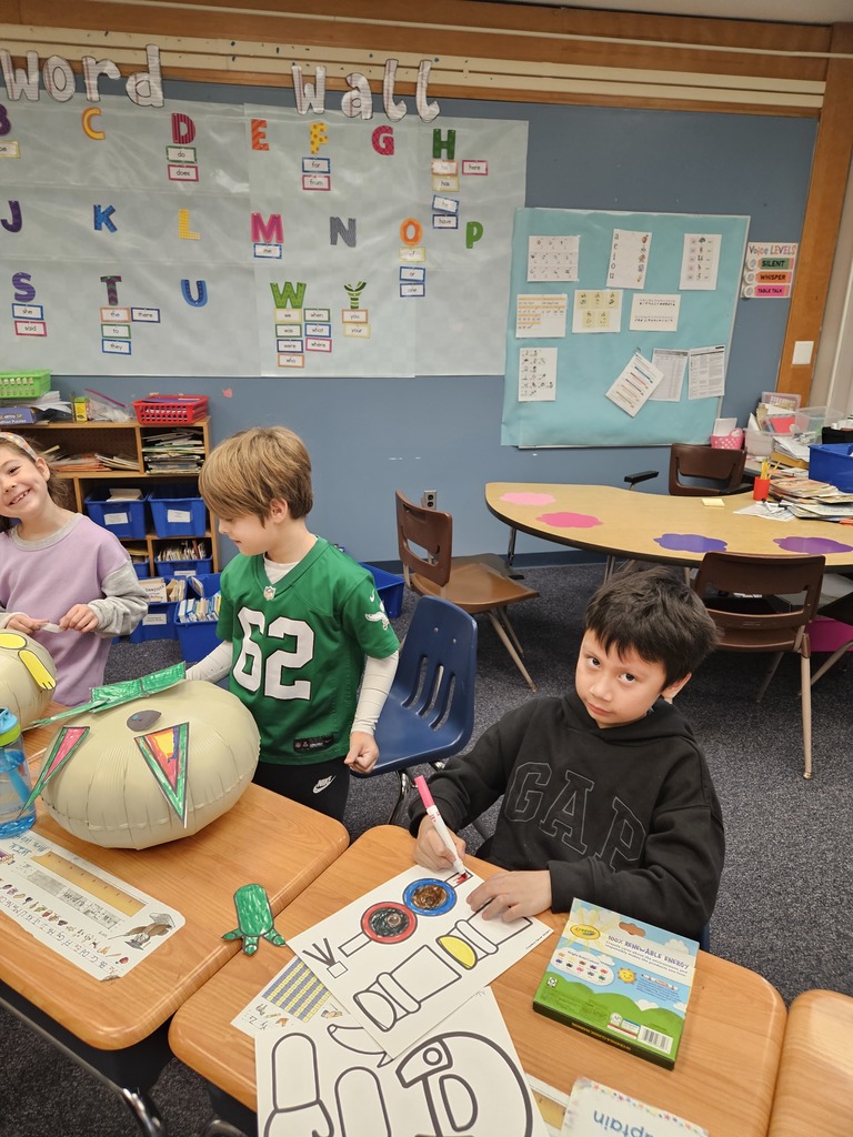 Students getting ready for our Thanksgiving Balloon Parade.