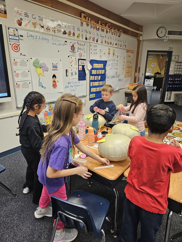 Students getting ready for our Thanksgiving Balloon Parade.