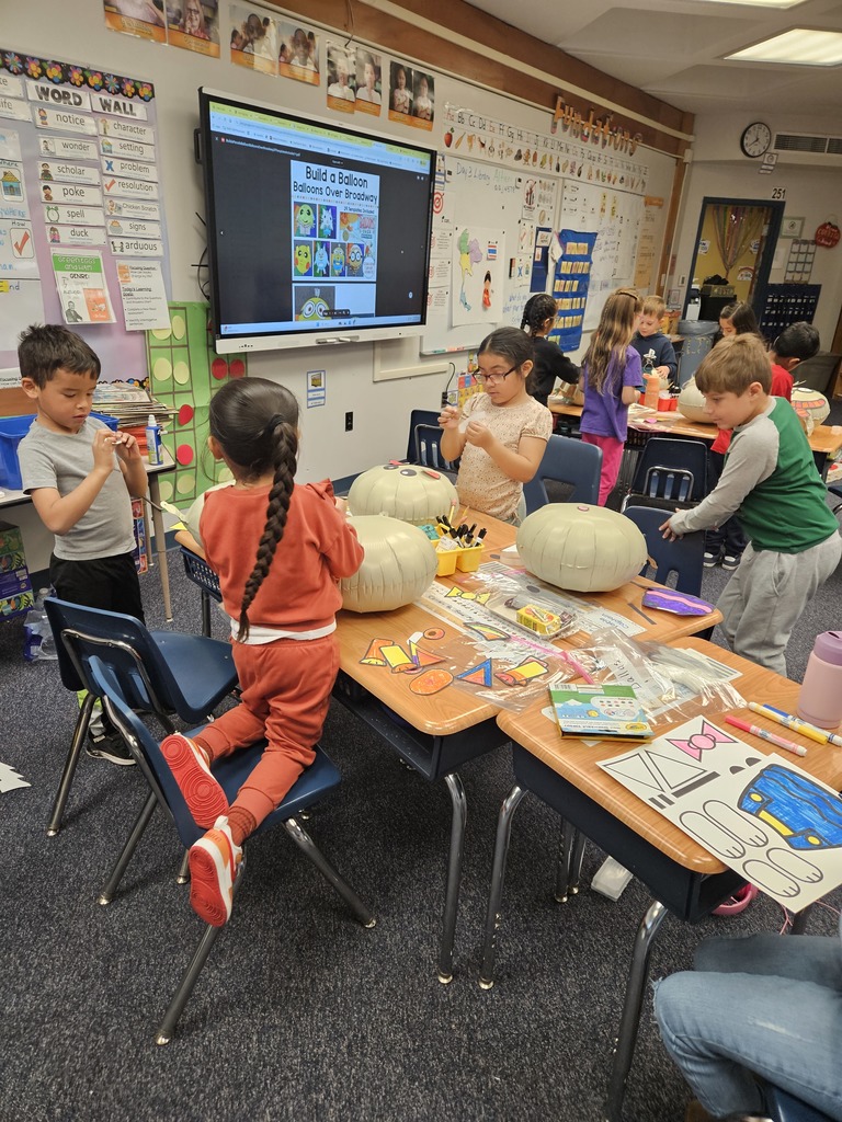 Students getting ready for our Thanksgiving Balloon Parade.