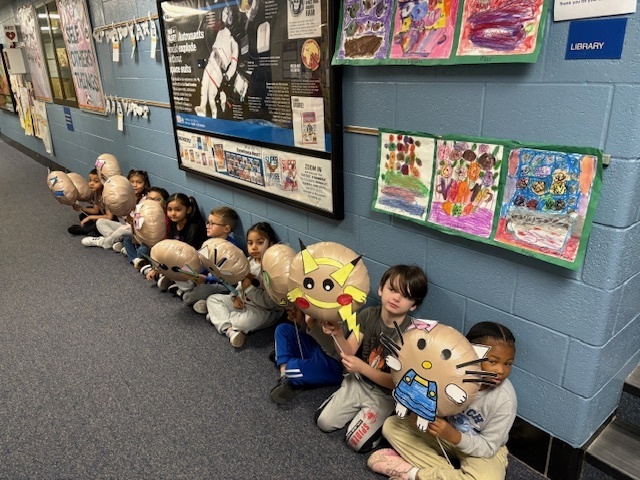 Students participating in the Thanksgiving Parade.