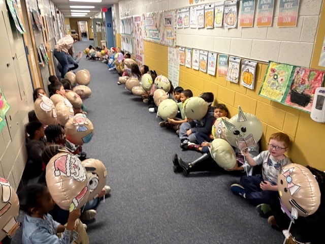 Students participating in the Thanksgiving Parade.
