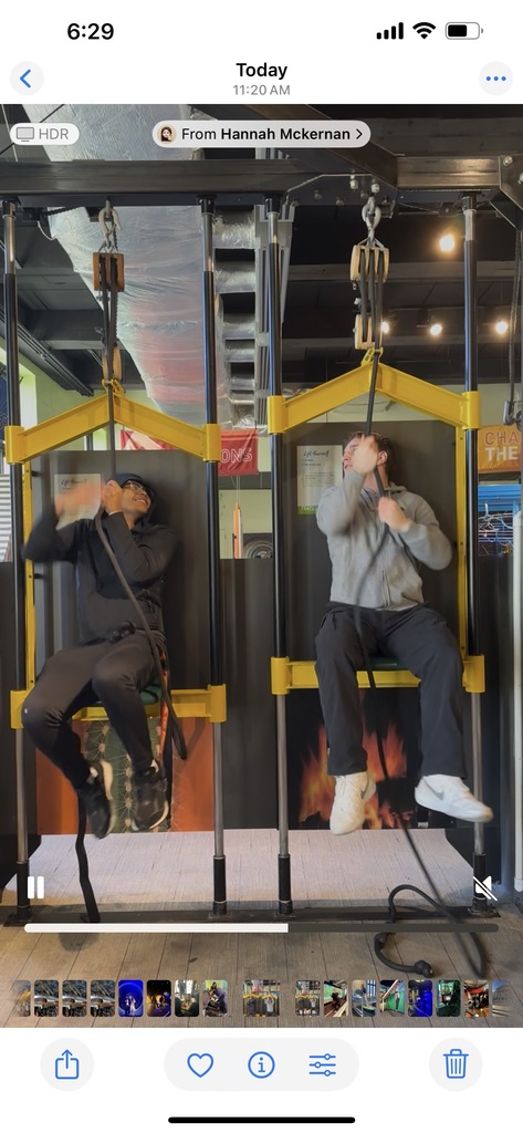 Two students are racing on a seat pulley system