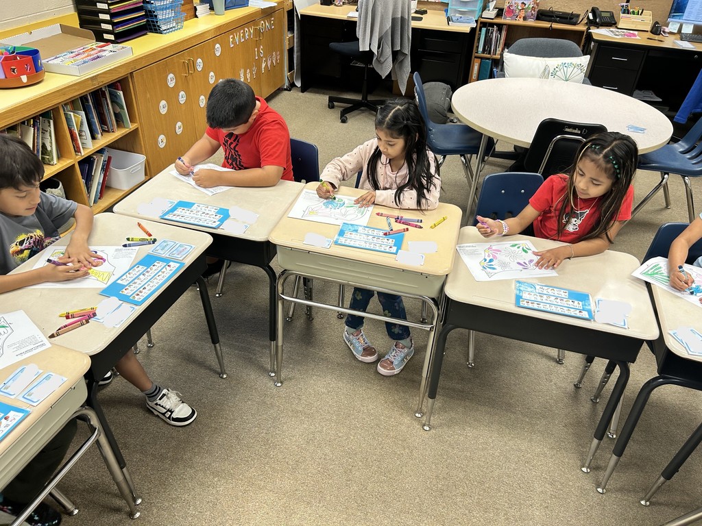 Students working on their Frida Kahlo project.