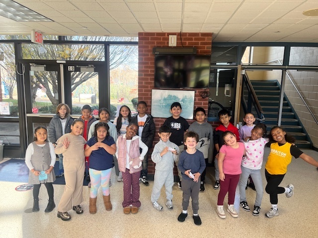 The students that earned 5 PAWS.